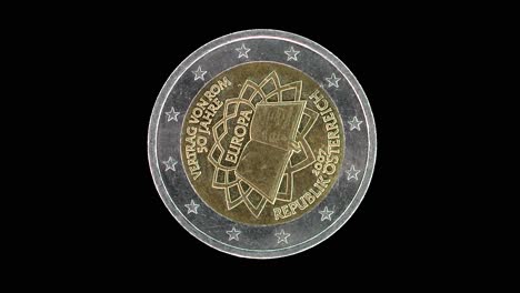 Austria 2007 2 euro obverse commemorating 50 years Treaty of Rome rotating on black background