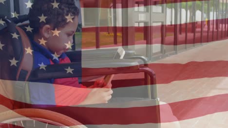 Disabled-mixed-race-child-with-US-flag-waving-foreground