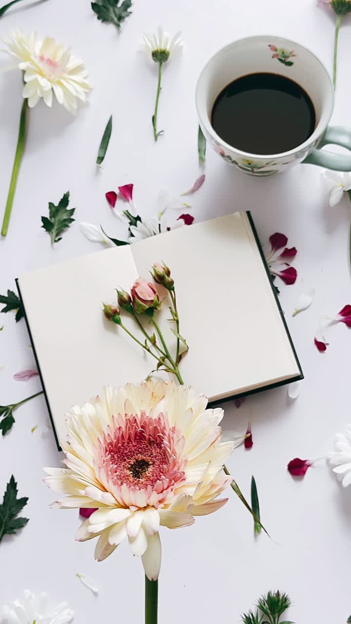 Elegant Floral Arrangement with Coffee and Notebook