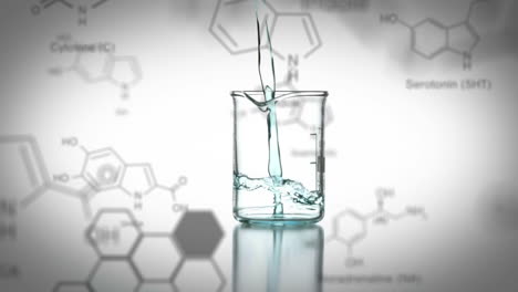 vaso de laboratorio con datos y fórmula estructural de compuestos químicos en primer plano