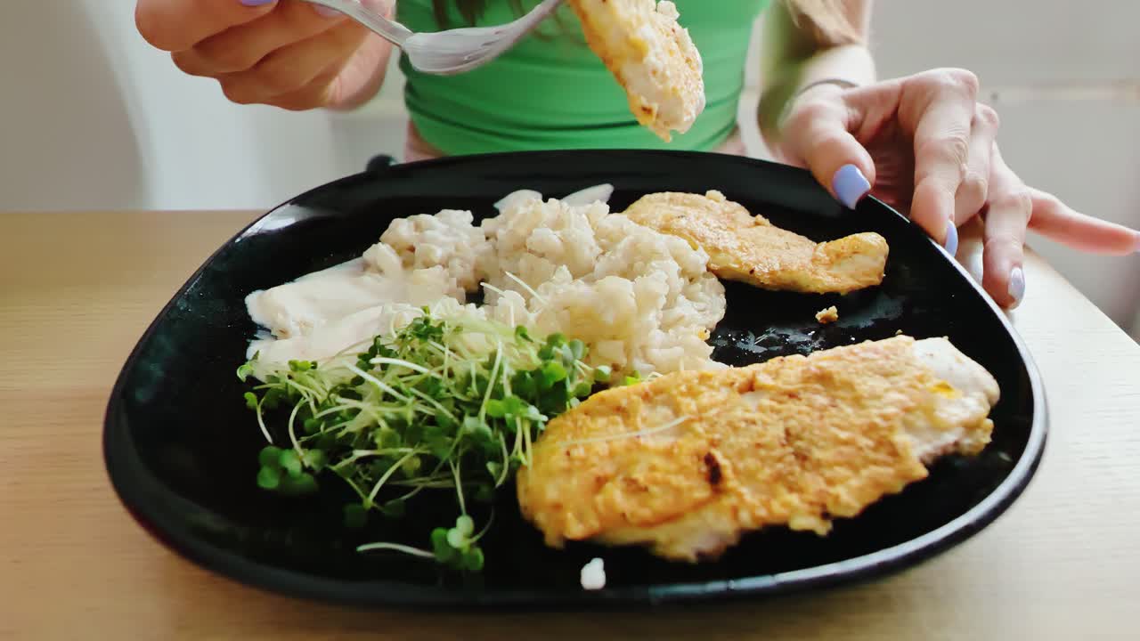 Closeup of healthy homemade lunch plate with fresh greens and grilled meat