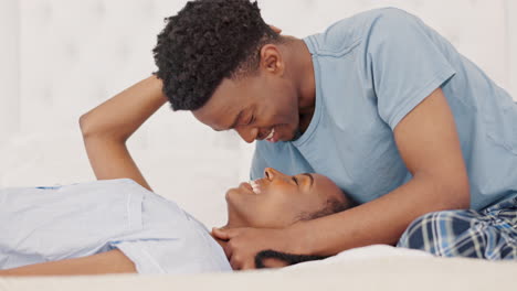 Love,-black-couple-and-kiss-in-bedroom