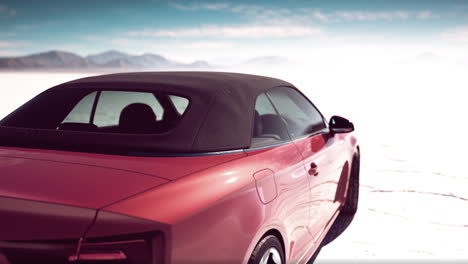 red convertible car in a desert landscape