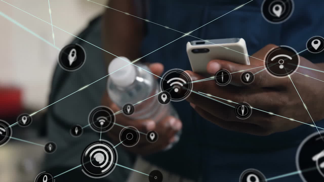 Animation of network of connections with wifi icons over african american man using smartphone
