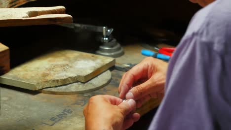 craftswoman working in workshop