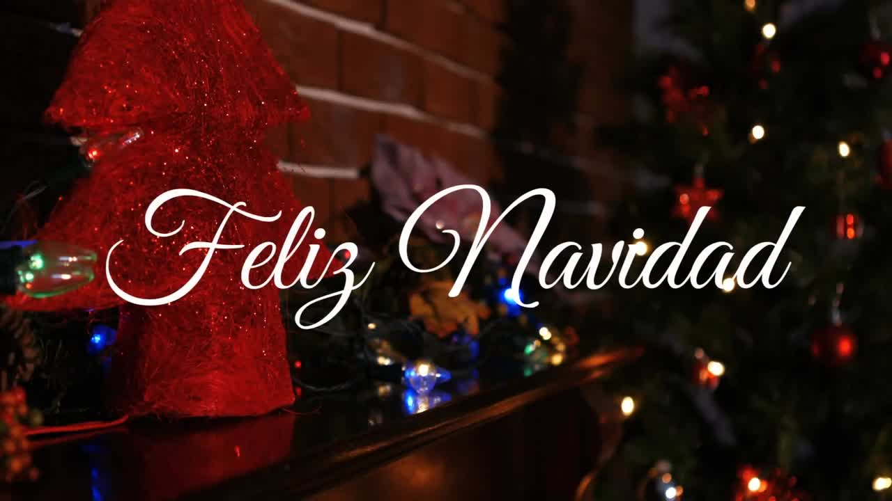 animación de felicitaciones navideñas españolas sobre el árbol de navidad y las decoraciones