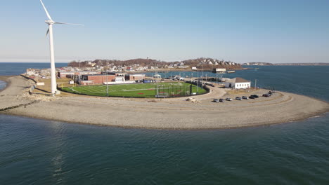 aerial footage moving forwards to lacrosse field, playing field located in hull, ma