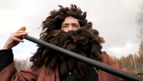 man in viking costume kayaking