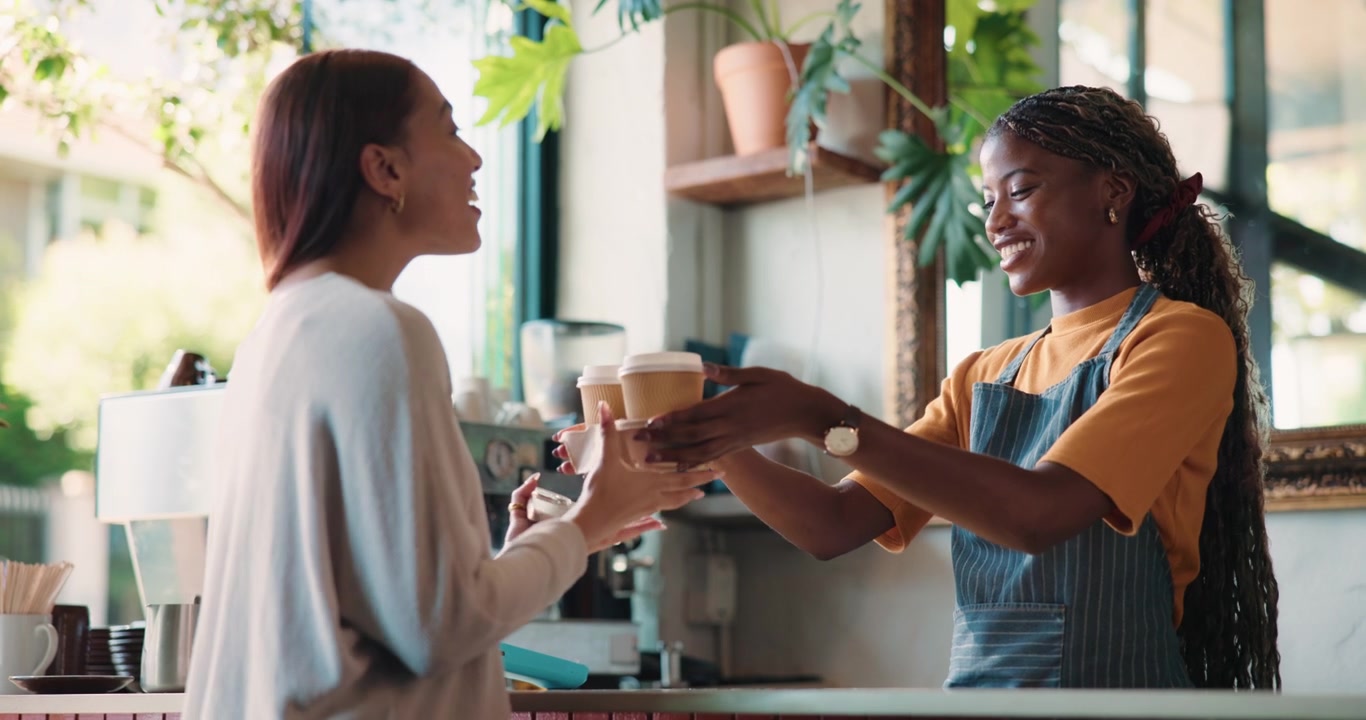 Customer Paying for Coffee with Smartphone at Cafe Counter