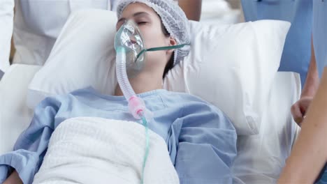 female patient receiving artificial ventilation