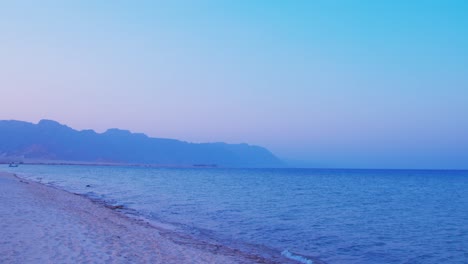 Sunset-over-the-sea-with-a-view-of-the-mountains