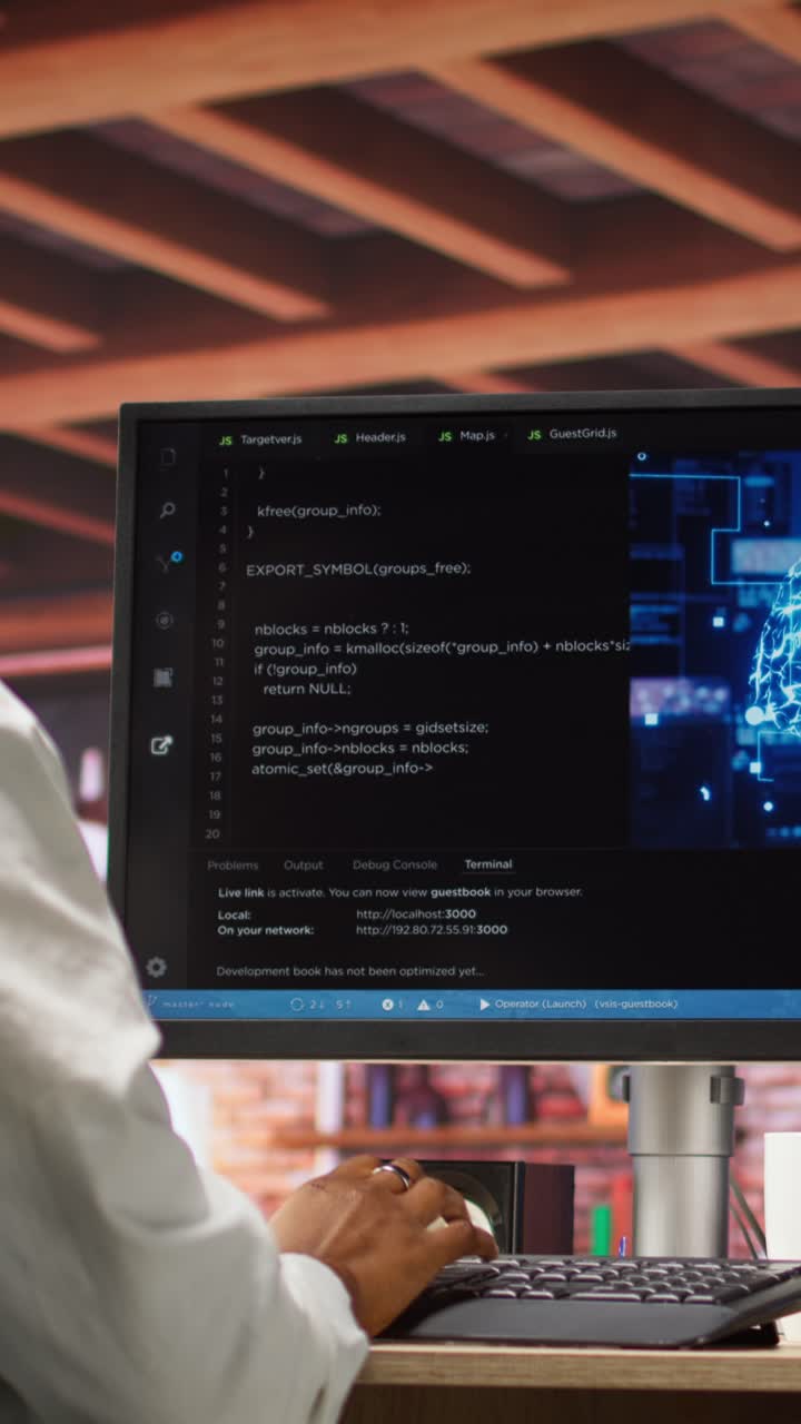 Vertical video Admin doing maintenance on artificial intelligence, listening music