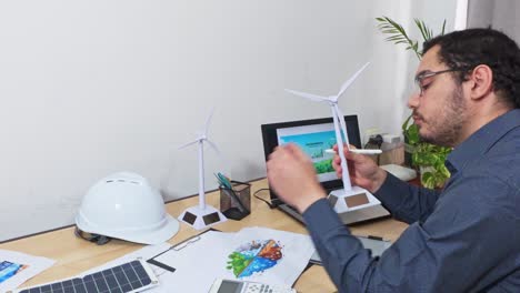 engineer using a smartphone for a renewable energy project