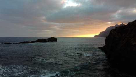 morning sunrise dusk. sea waves breaking in the coast. drone aerial 4k footage, waves crashing over rocks. son raising on