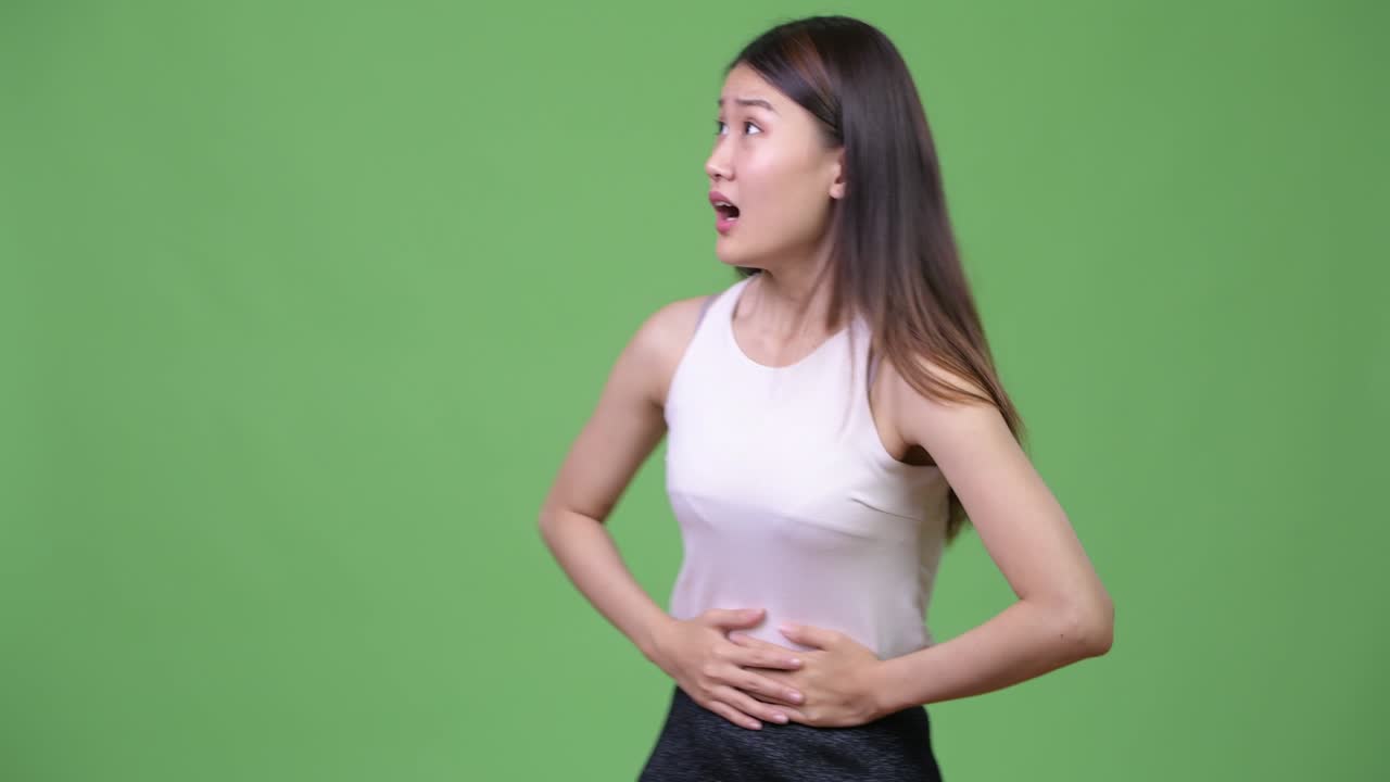 Young beautiful Asian businesswoman hav