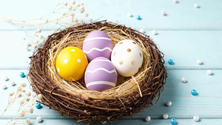 Decorated colorful easter eggs in a nest