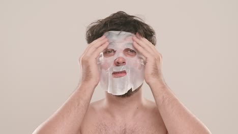 man applying face mask