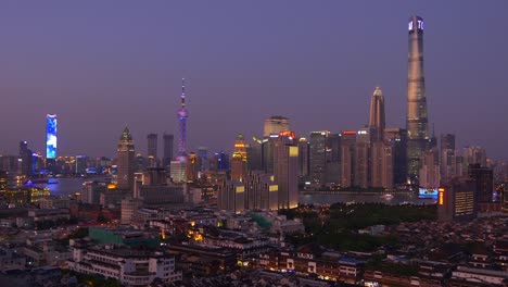 sunset night illuminated shanghai city downtown rooftop panorama 4k china