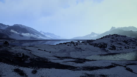 Winter-landscape-with-snow-covered-rocks-at-Arctic-Ocean