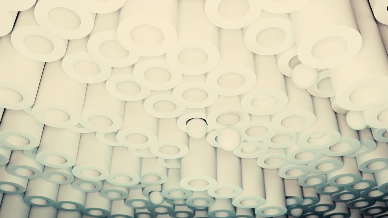 Low angle view of a dense overhead arrangement of white cylindrical forms with circular openings, creating a modern geometric pattern with soft diffuse light