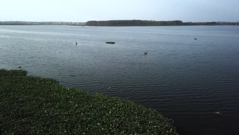 a calm lake with smooth waves in india