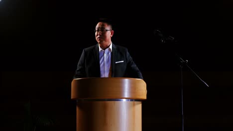 businessman giving a speech