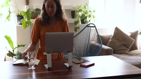 caucasian woman doing a video call at home