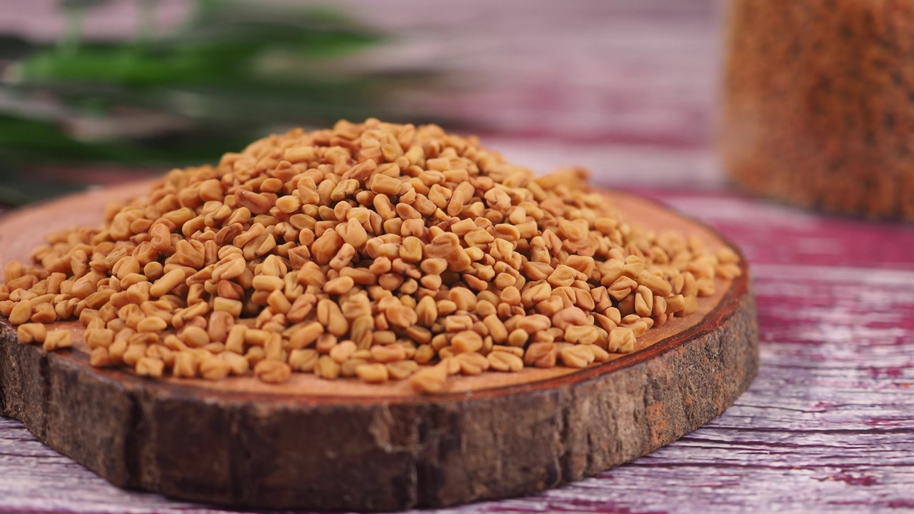 Close-up of Fenugreek Seeds on a Wooden Board