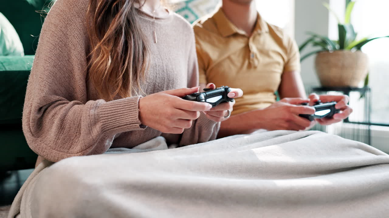 Couple playing video games together