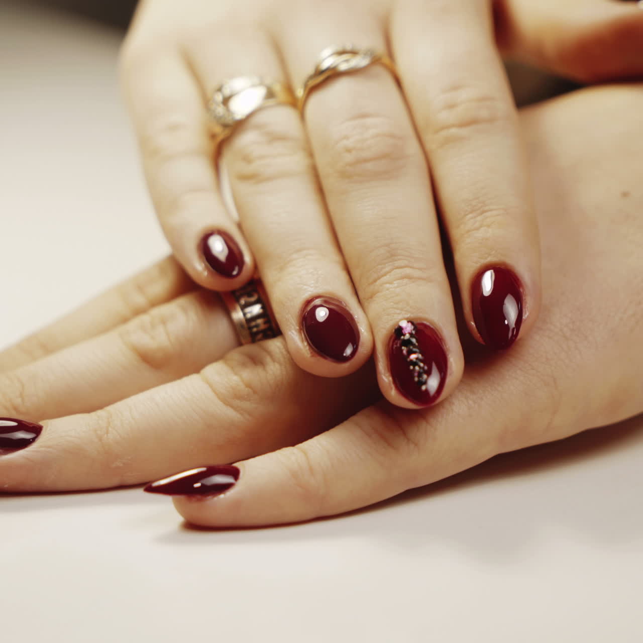 Manicure concept. Hand care at the spa. Beautiful woman's hands with perfect manicure at beauty salon. Square video