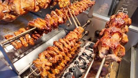 roasted chicken and chicken wings on skewers