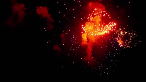 fireworks flashing in the night holiday sky