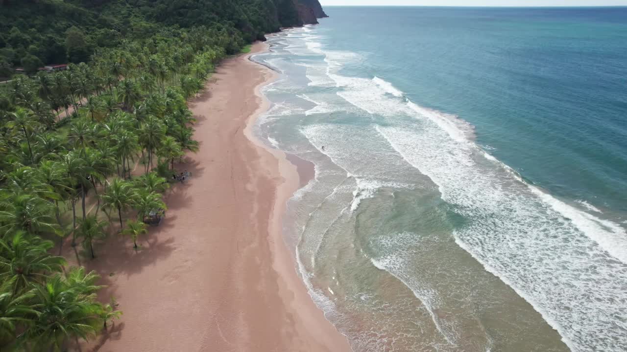 Aerial view of serene coastline and ocean waves in Venezuela
