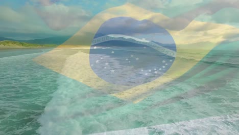 digital composition of waving brazil flag against aerial view of beach and sea waves