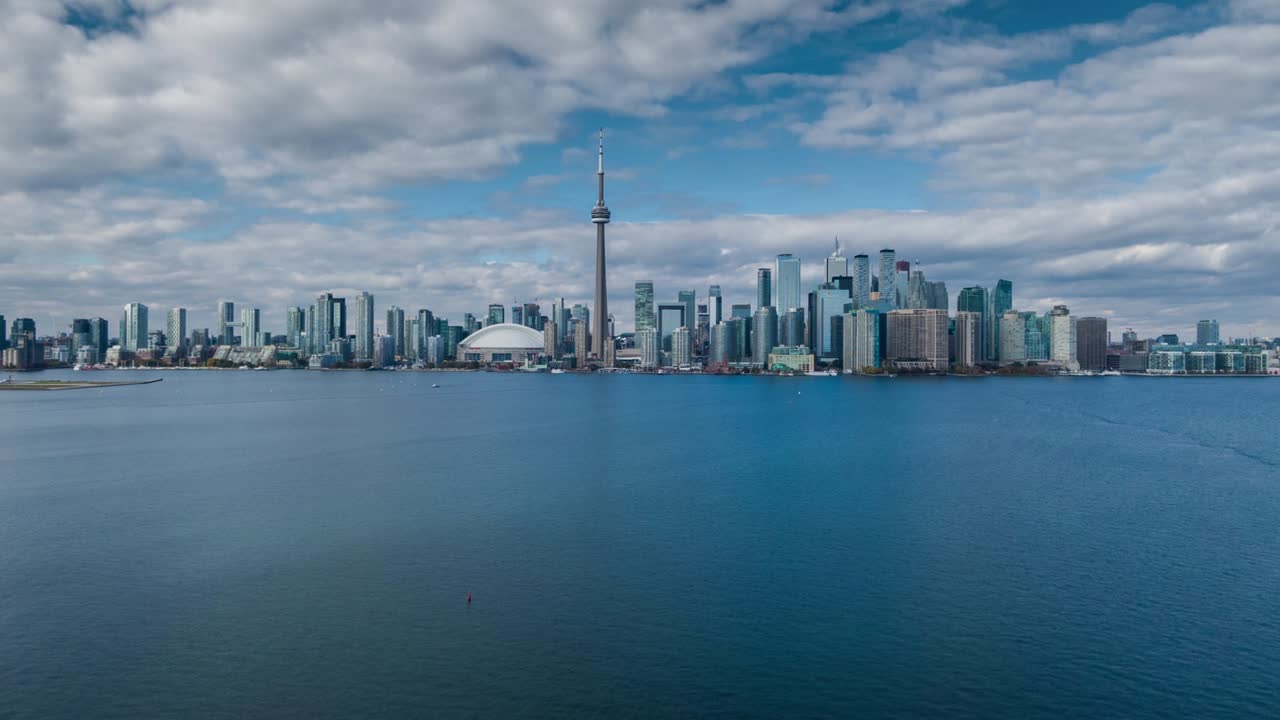 Aerial Motion Timelapse View of Toronto Skyline and Lake Ontario During Summer in Toronto, Ontario, Canada