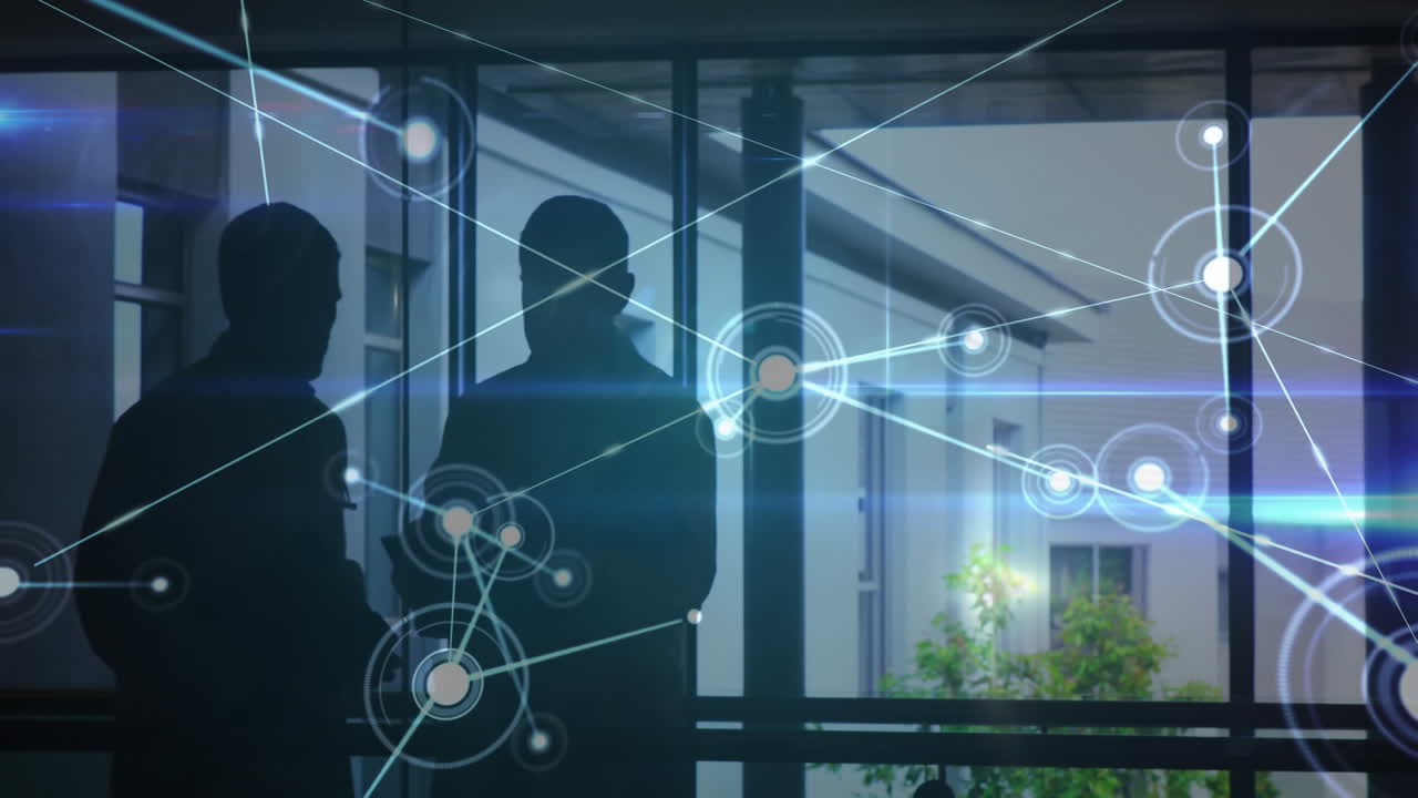 Doctors use a tablet with a glowing network animation for medical research.