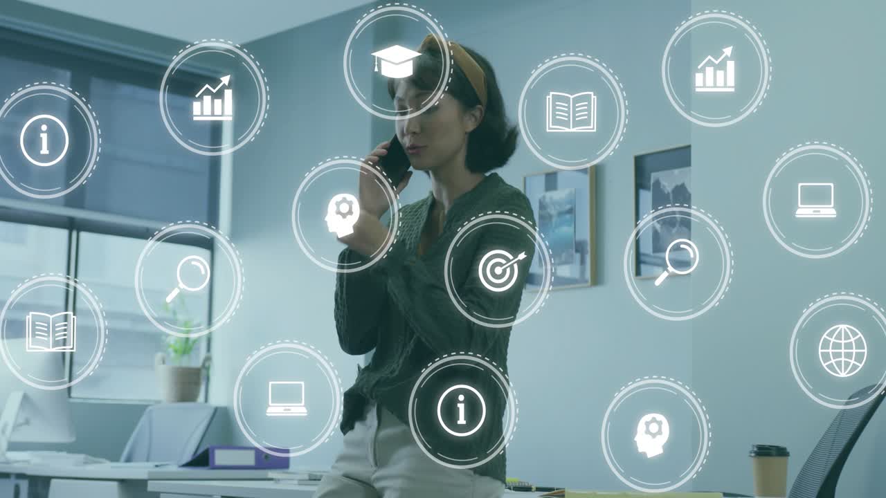 Woman sitting on desk starting phone call in tech office, reviewing data with icons overlaying face