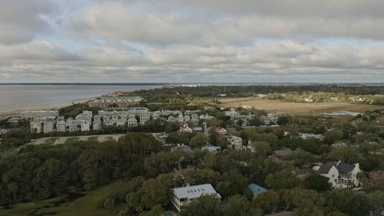 st simons georgia aerial v4 pan left shot of waterside neighborhood and st simons sound - march 2020