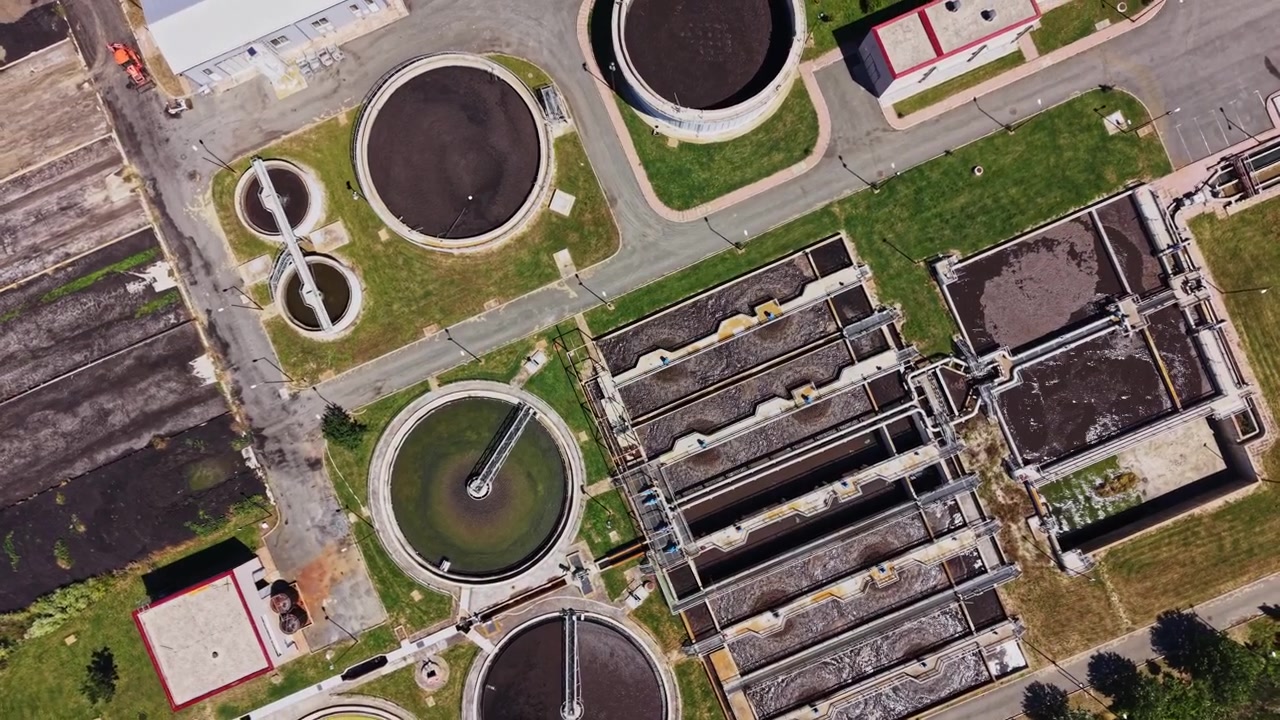 Water treatment facility in operation with various tanks and structures