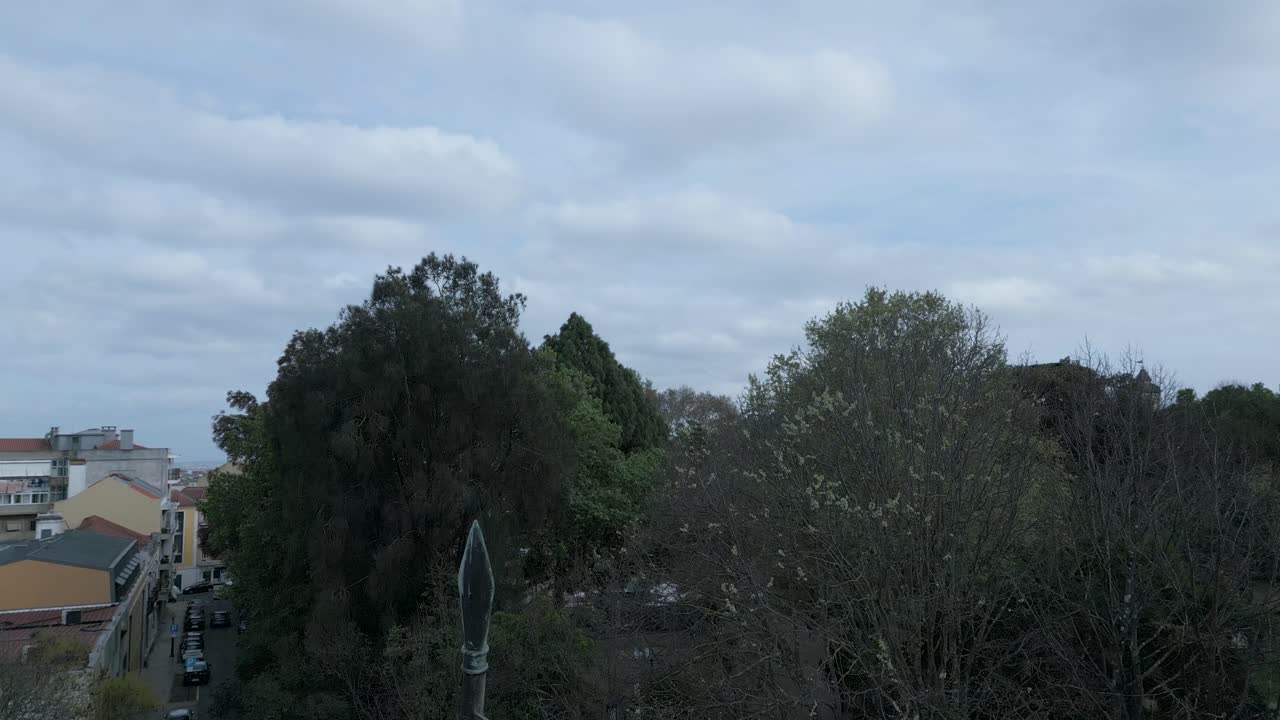 Aerial view of Lisbon city center with amazing tagus river in background with famous monument in front, showcasing the beauty of Portugal's capital