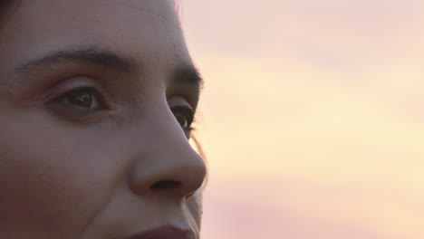 close up portrait of beautiful woman exploring spirituality looking up praying contemplating journey with wind blowing hair in countryside enjoying peaceful sunset