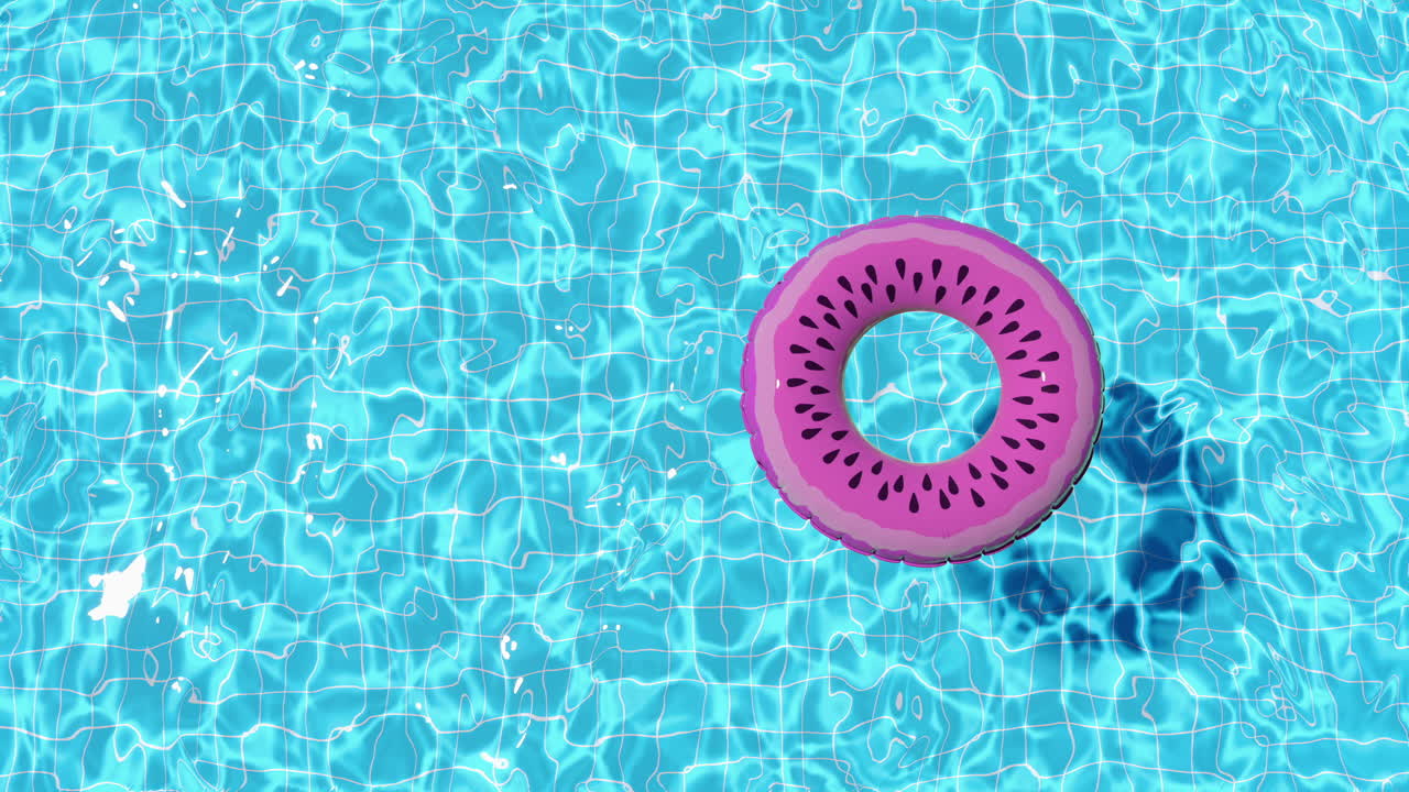 Loop inflatable swimming ring floats in the pool in summer top view