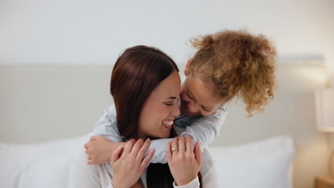 Bedroom,-happy-and-mother-hug-child-in-home