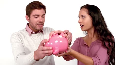 poor couple with moving box and piggy bank