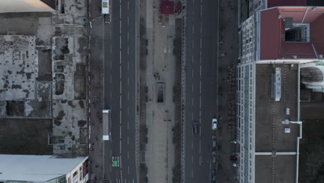 AERIAL:-Beautiful-Overhead-View-of-Berlin-Central-with-Pedestrians-on-Sidewalk-and-Car-Traffic