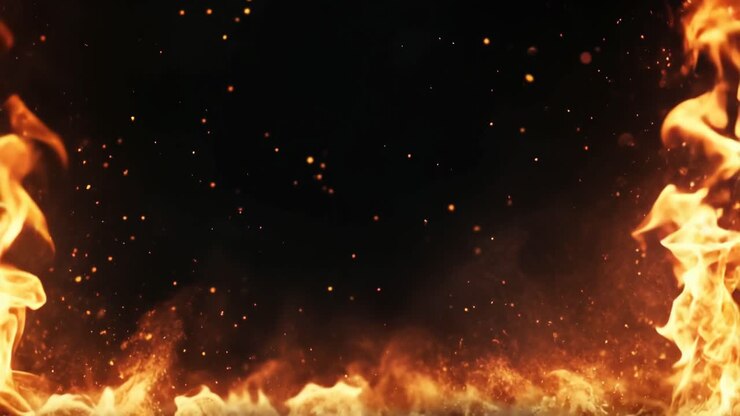 Dynamic video background of intense flames and sparks against a dark backdrop, captured from a low