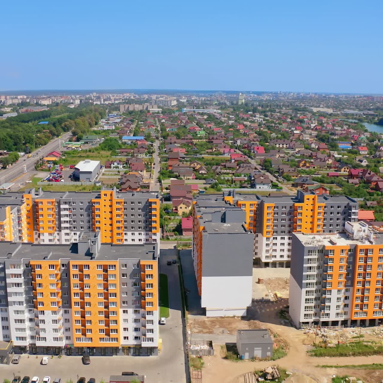 Panoramic view of a city. Multi-storey apartment buildings built in the new city district. Modern residential high-rise complex. Aerial view