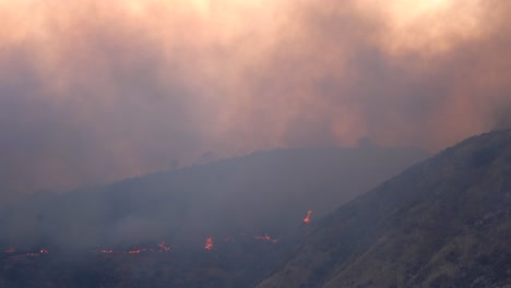 large plume of smoke from wildfire