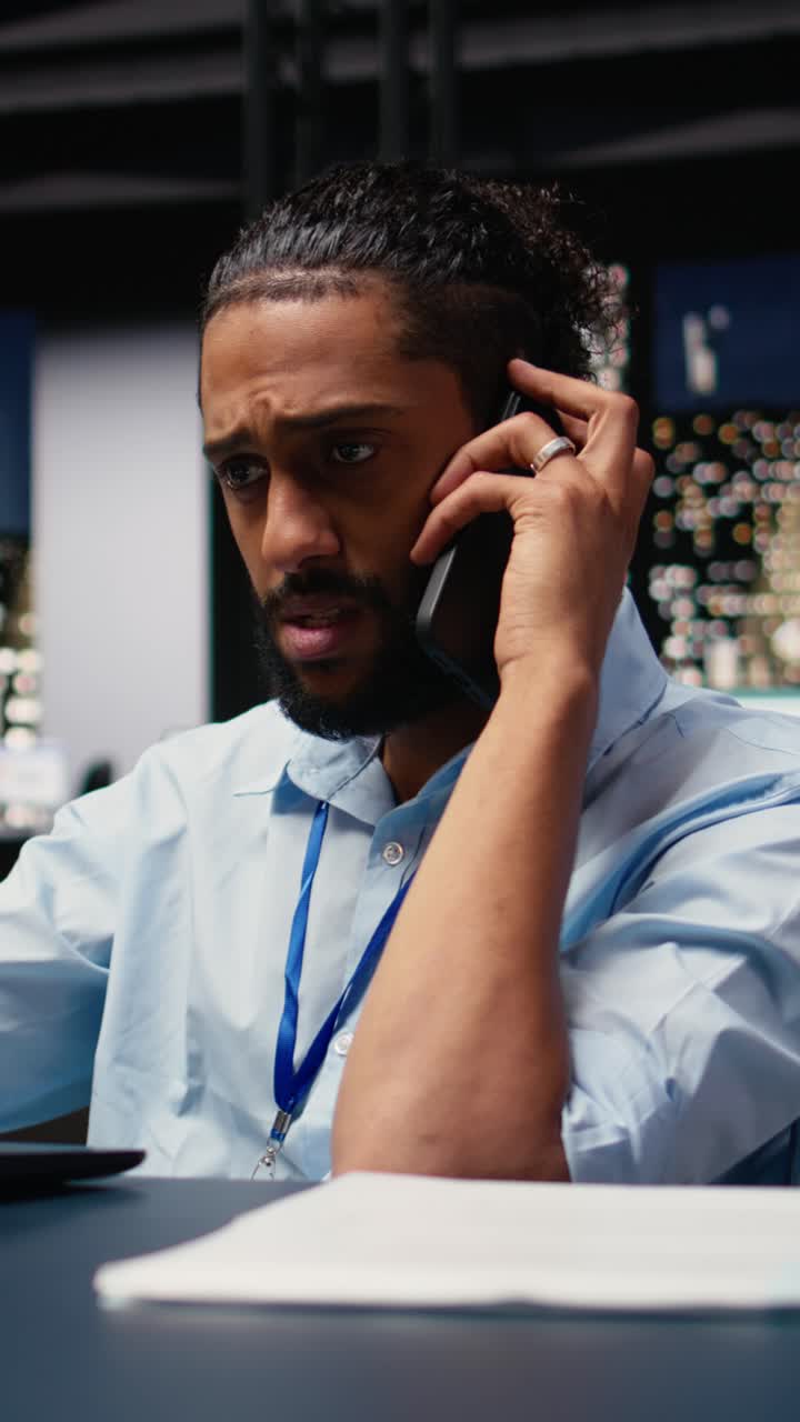 Vertical Video Middle eastern man with reduced mobility in wheelchair on phone call