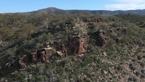 Aerial-orbiting-over-Rocky-landscape-mountain,-Beautiful-natural-scenery,-Horrocks-Pass